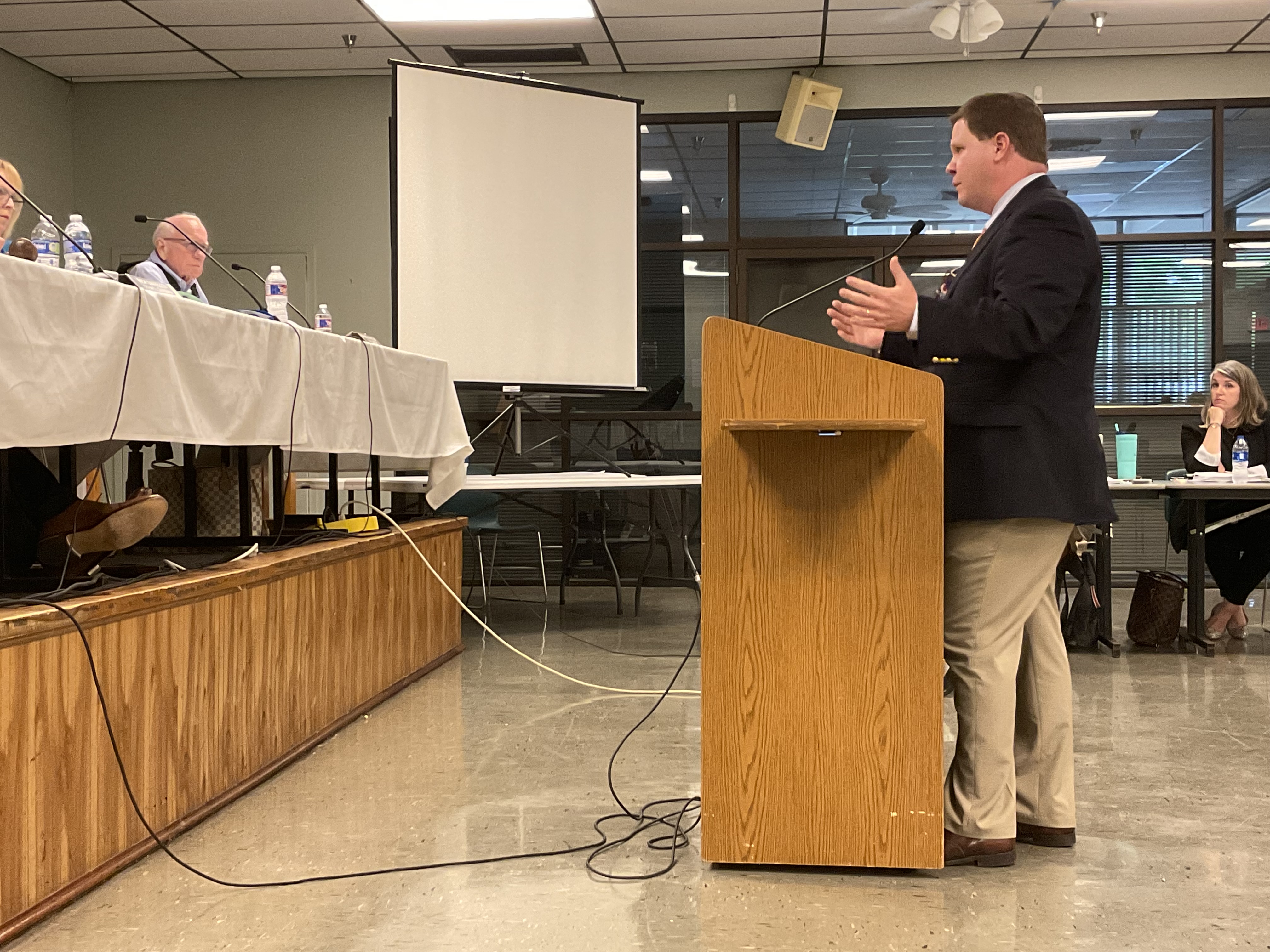 District II Councilman Skelly Kreller and Mayor Clay Madden face off during debate over the proposed contract to hire a disaster planner at the May 27, 2021, Mandeville City Council Meeting (Mandeville Daily/William Kropog)