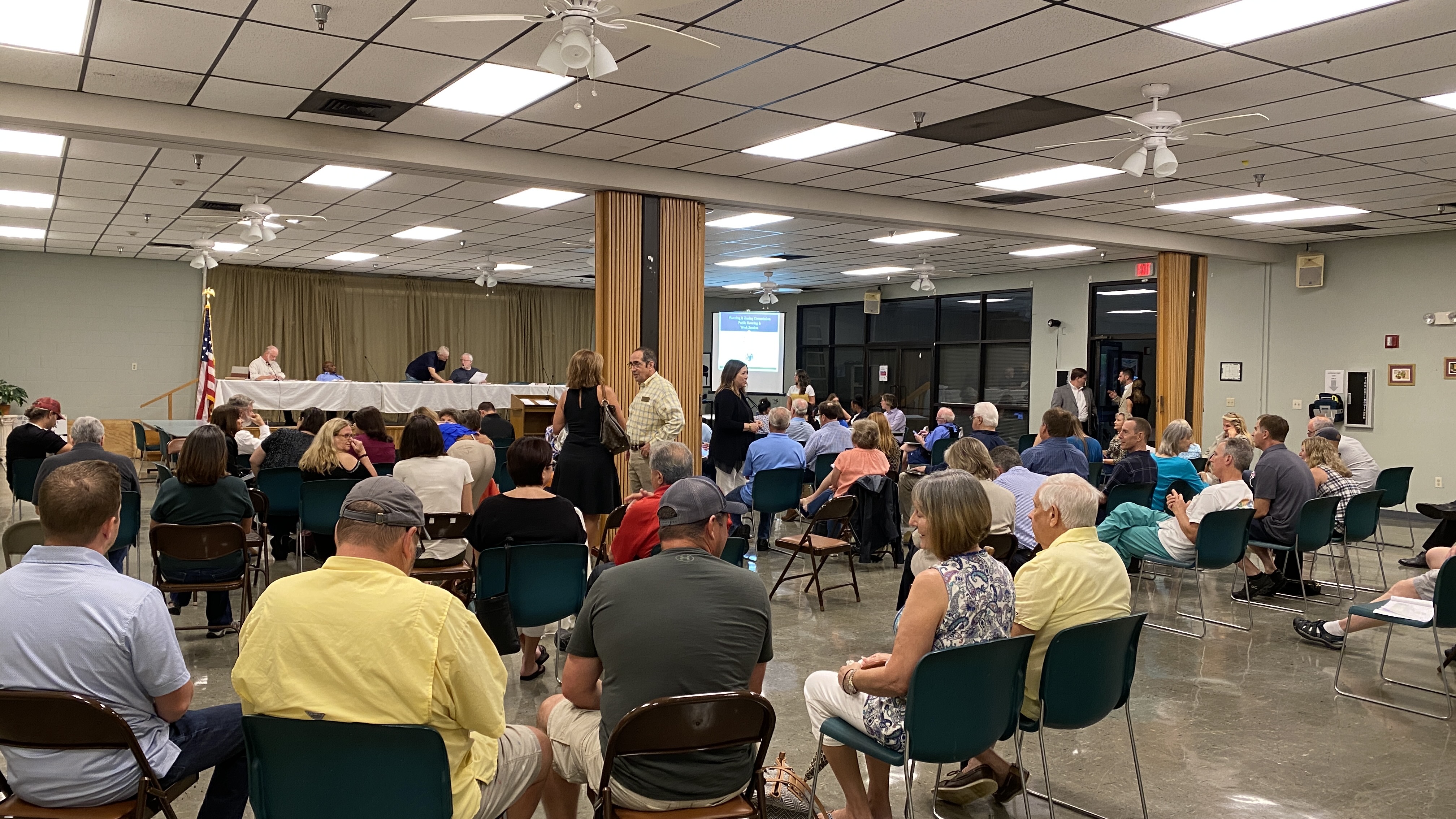 The crowd started filling up the Paul Spitzfaden Community Center before the scheduled start of the June 22, 2021, Planning & Zoning Commission meeting. (Mandeville Daily/William Kropog)